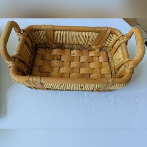 Wood And Natural Leaves Woven Basket.